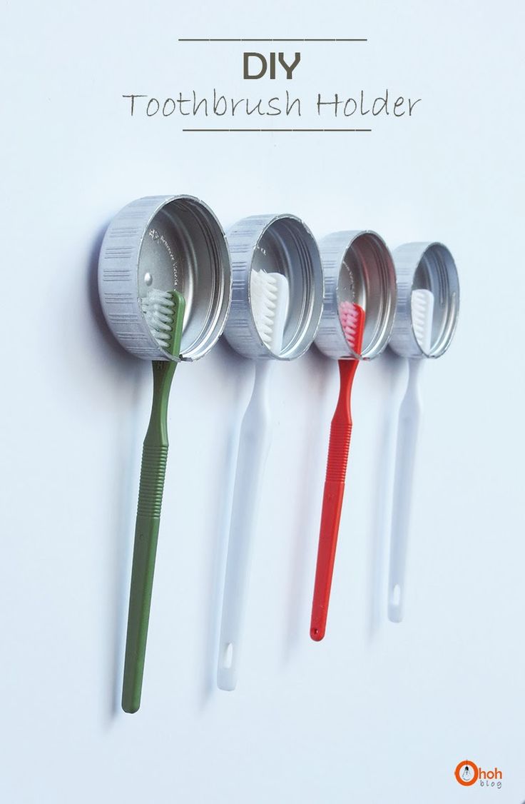 Soporte cepillos de dientes con tapones de plástico